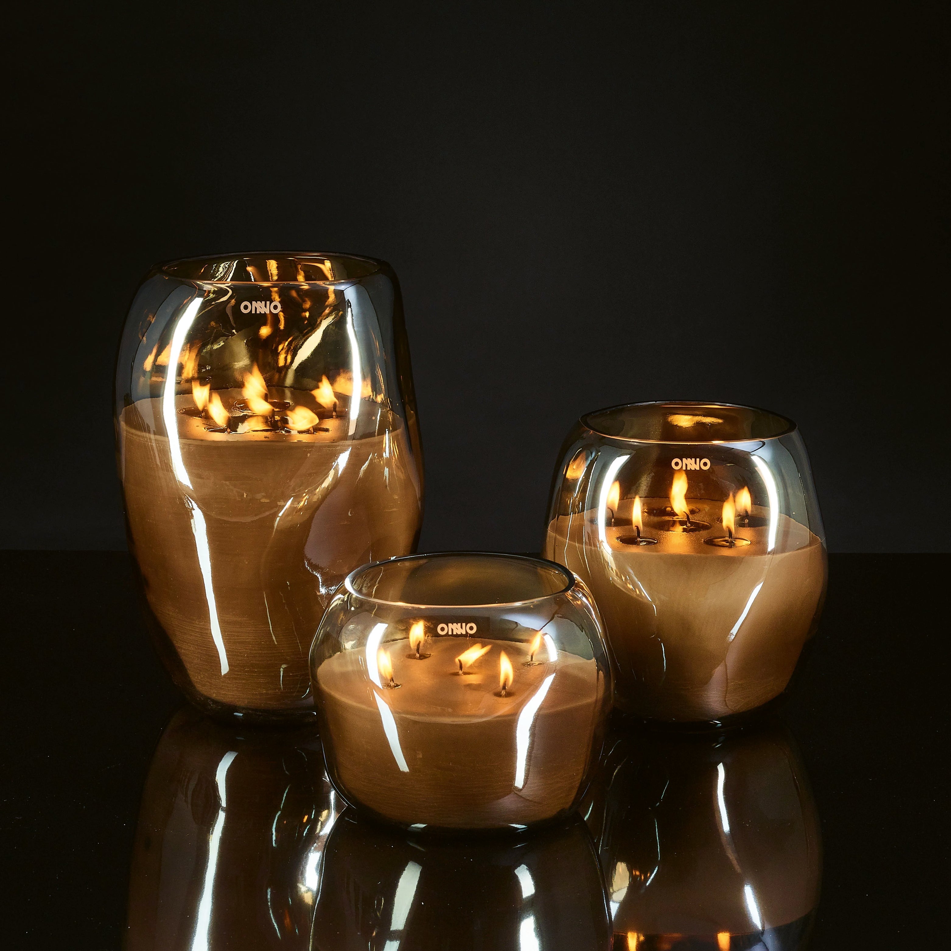 ONNO Cape Duftkerzen – handgegossene Designkerzen im Glas mit warmem Bernsteinduft und edler Lichtwirkung