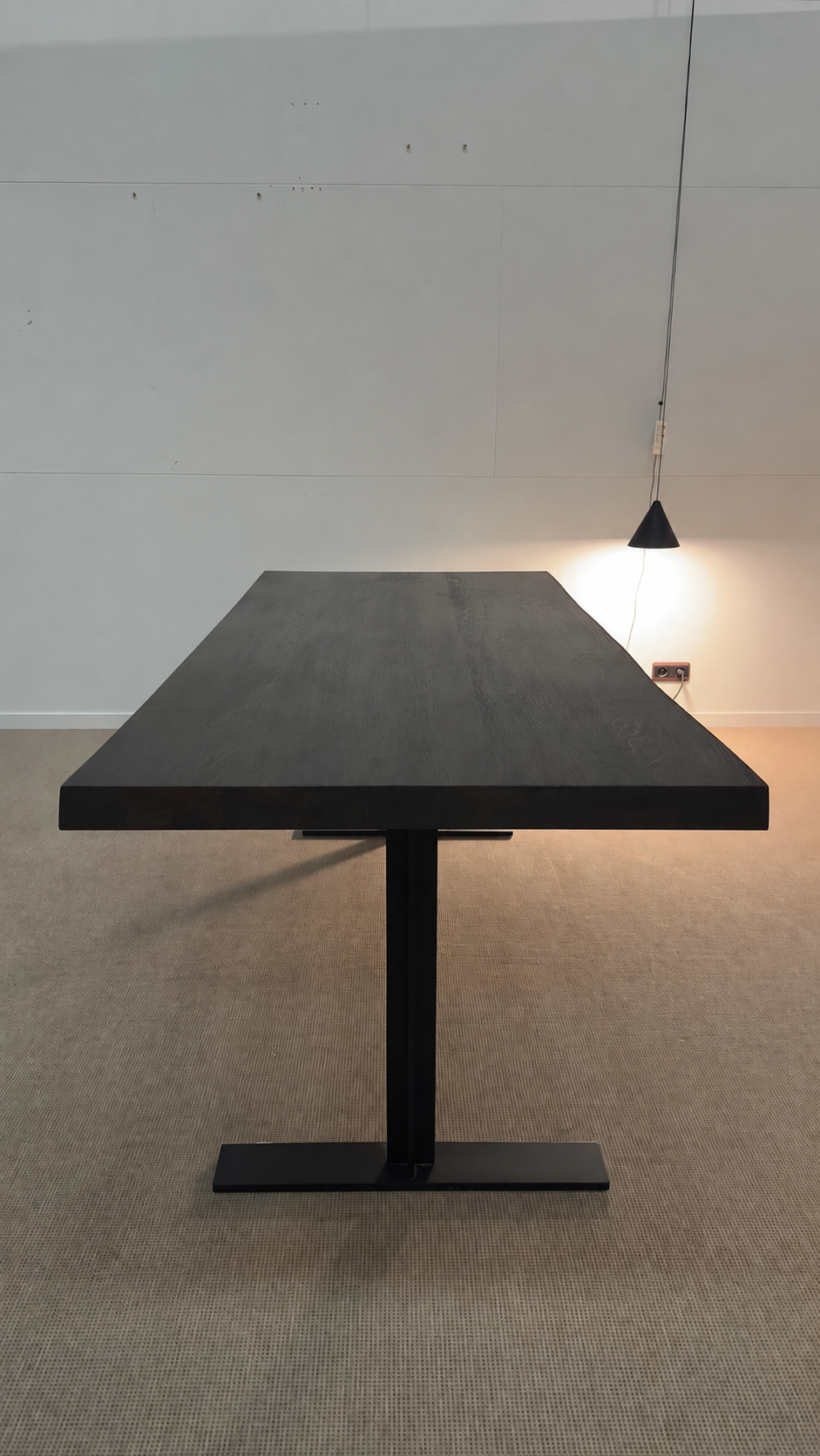 Michel Denolf LARRY Dining Table Made of Charred Chestnut Wood, on Display