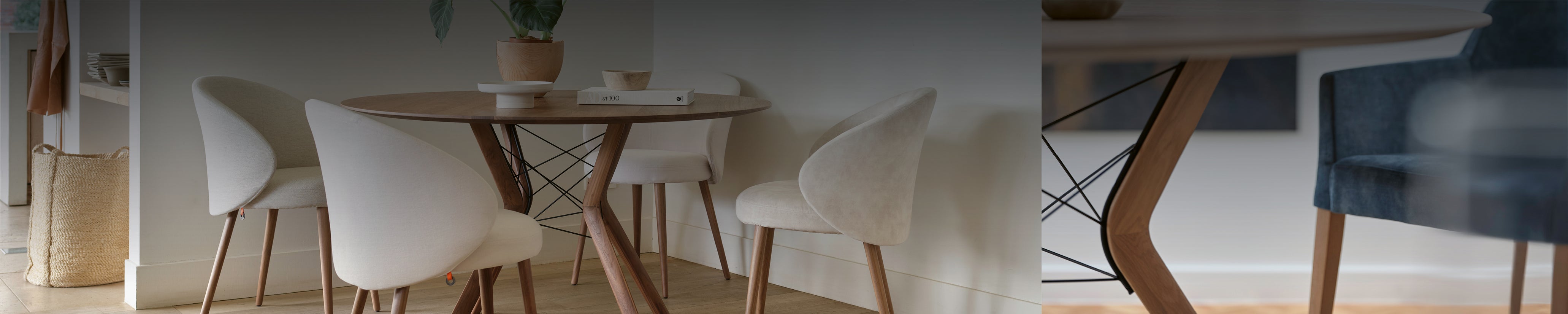 Mobitec ECLIPSE Tisch mit skulpturalem Holzgestell, kombiniert mit eleganten Stoffstühlen in einem hellen, wohnlichen Interieur