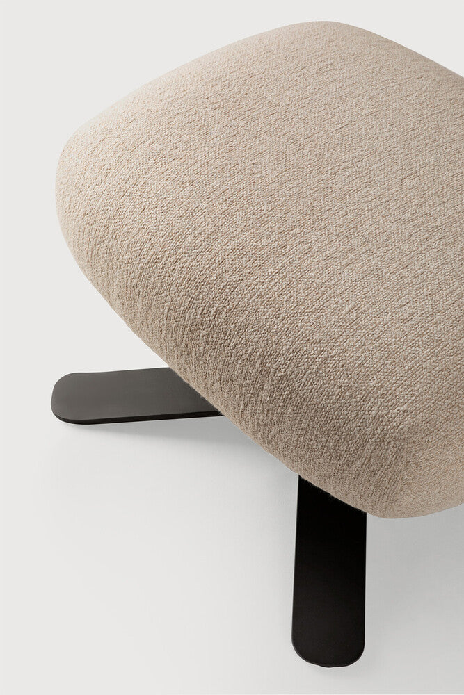 Ethnicraft MERGE Footstool – Detail of the fabric upholstery in Loam and the rounded edges of the cushion.