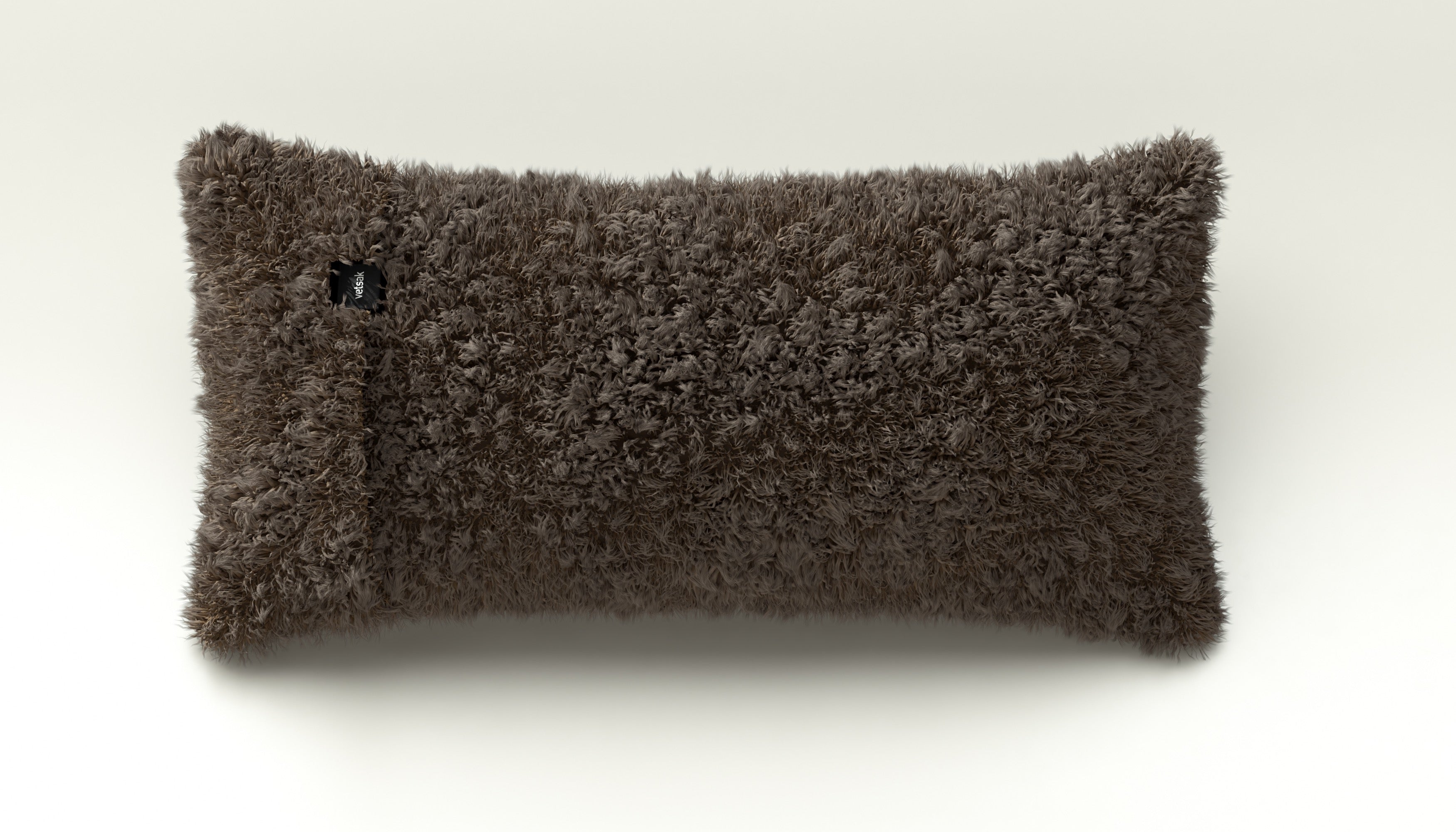 Kleines Kissen aus Doodle Cacao – warme Farbgebung kombiniert mit ausdrucksstarker Haptik