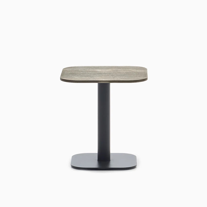 Vincent Sheppard KODO side table with a powder-coated aluminum frame in Fossil Grey and a ceramic top in Flint.