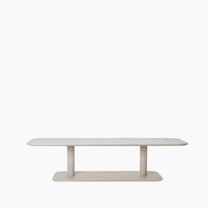 Vincent Sheppard KODO rectangular coffee table with a powder-coated aluminum frame in Dune White and a ceramic top in Shards.