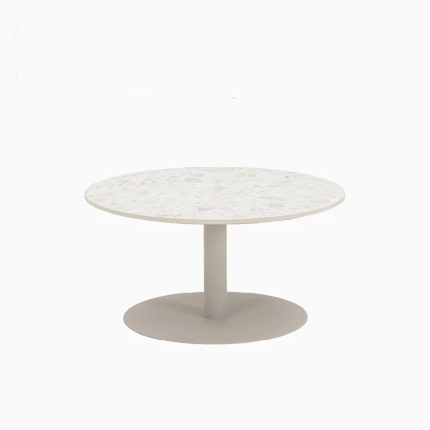 Vincent Sheppard KODO Round Coffee Table with a powder-coated aluminum frame in Dune White and a ceramic top in Shards.