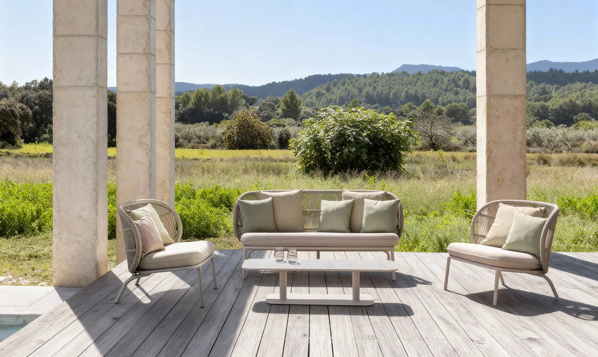 Vincent Sheppard KODO Coffee Table as a Set in the Outdoor Lounge Area in Dune White