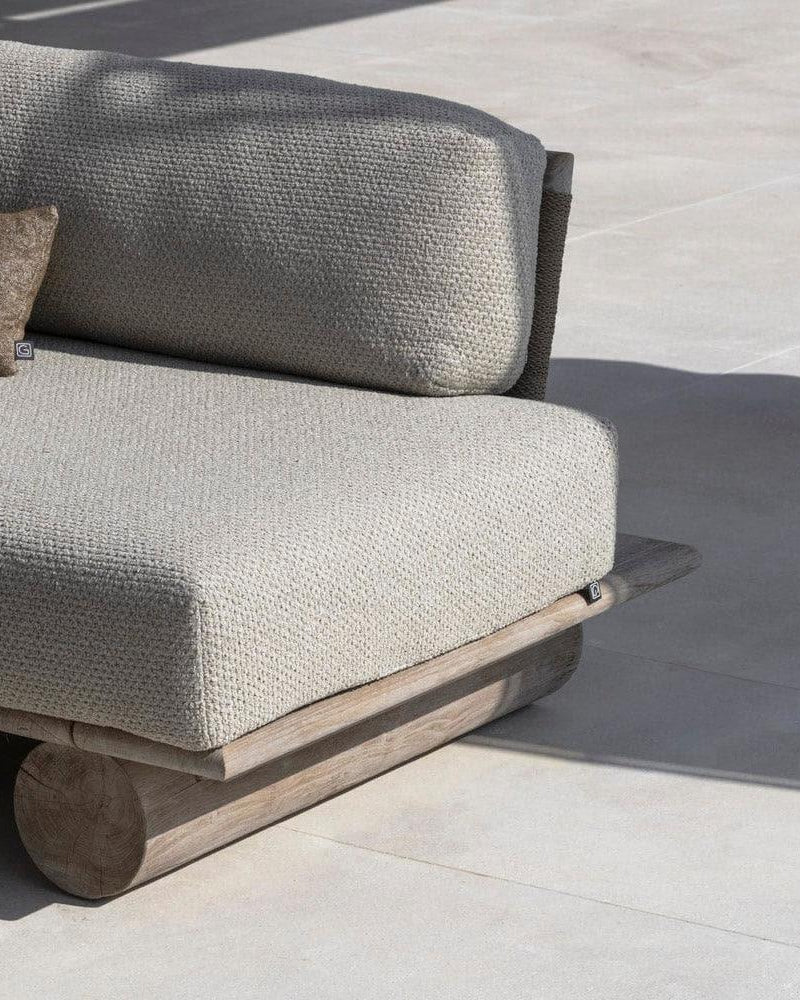 EDGE outdoor sofa by Gommaire by the pool - luxurious garden sofa with a straightforward design made from recycled teak for stylish pool lounges