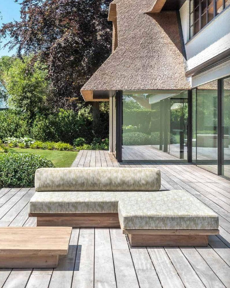 MAGNUS stool from Gommaire with matching sofa on the terrace - stylish outdoor combination of teak and weatherproof cover