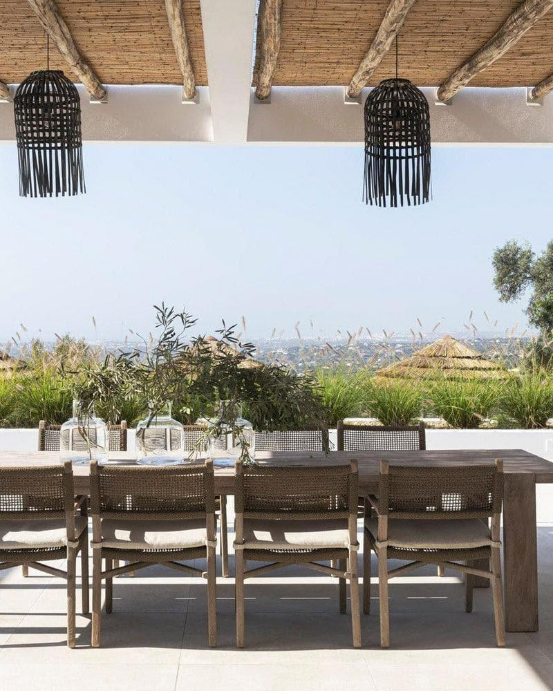 Gommaire JACOB dining table on terrace - elegant teak table with four garden chairs, perfect for modern outdoor dining areas