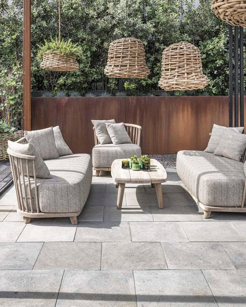 LOUNGE CAROL garden sofa from Gommaire on the terrace - stylish combination of natural materials and weatherproof cushions for modern outdoor areas