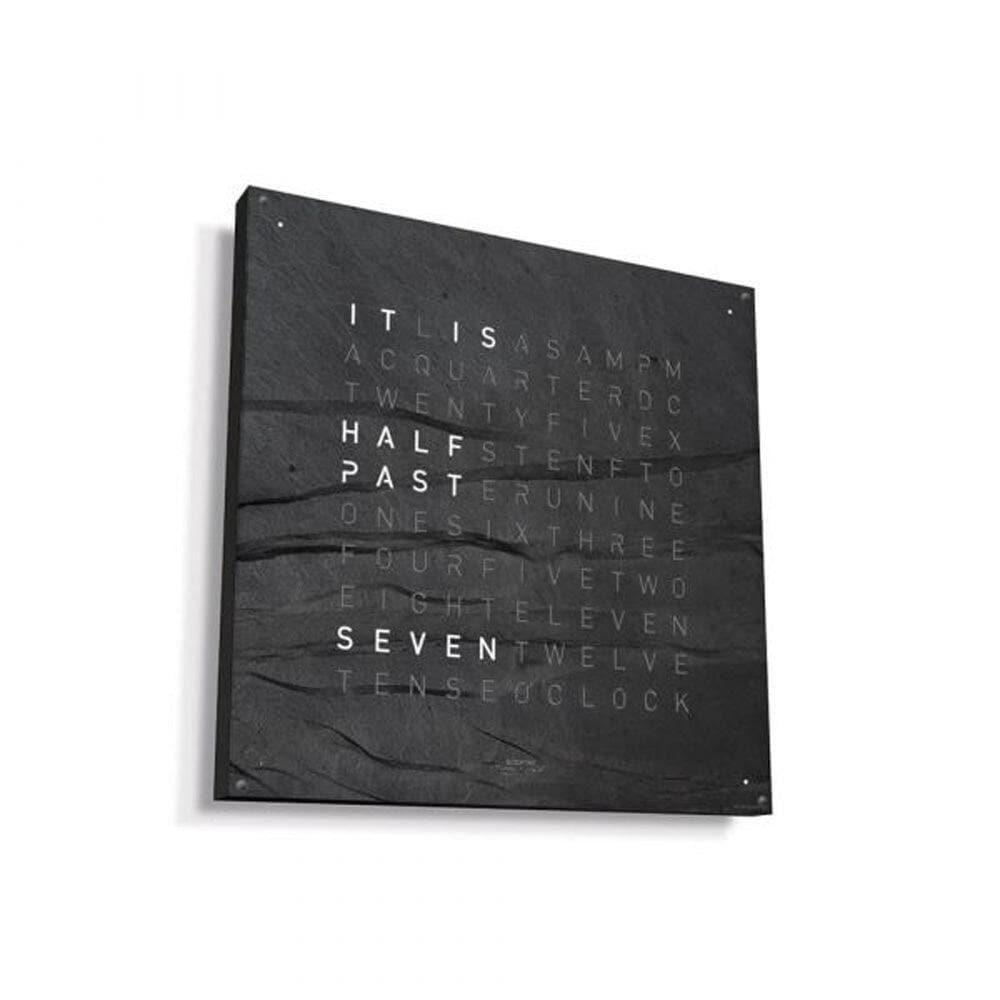 QLOCKTWO EARTH 45 with black frame – bold metamorphic stone design for a truly unique wall clock