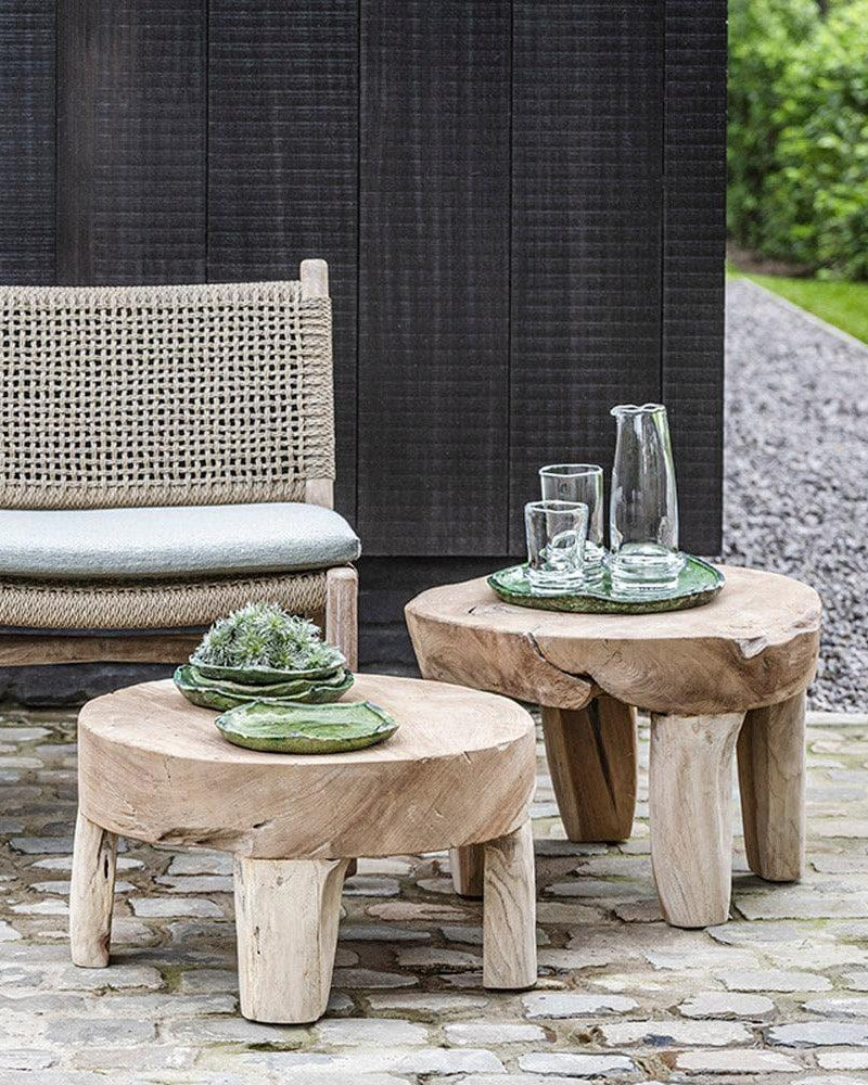 Side tables SAMBA by Gommaire on wooden deck - stylish, round teak table to complement the outdoor lounge chair for cozy garden moments