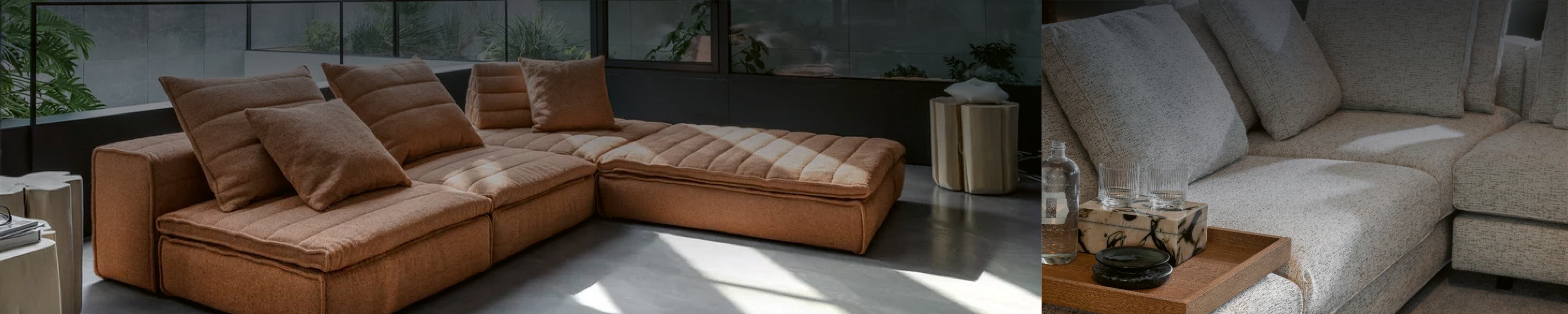 L-förmiges Designsofa mit großzügiger Liegefläche, gepolstert in texturiertem Stoff, in einem architektonischen Wohnambiente mit viel Tageslicht