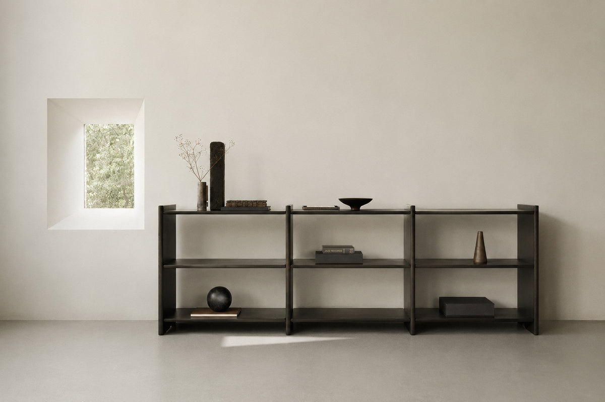 Ethnicraft MORTISE shelf, 262 cm wide, made of solid mahogany, serving as open storage furniture in a spacious room.