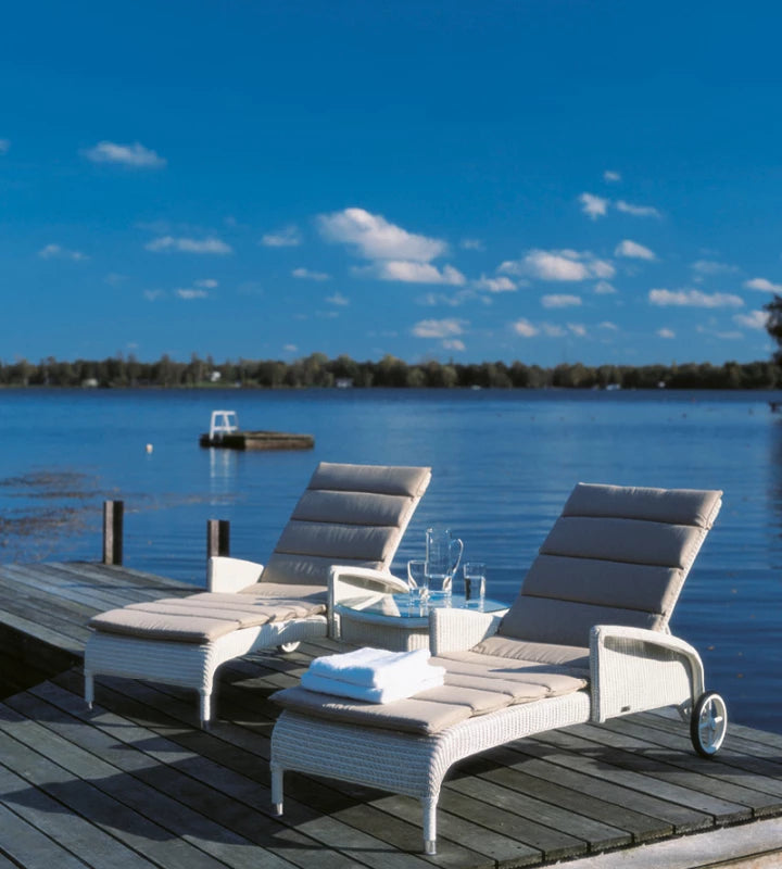 Vincent Sheppard DOVILE Sun Lounger in Quartz Grey on a terrace