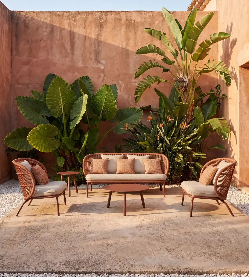 Vincent Sheppard KODO Garden Sofa with Seat and Decorative Pillows in the Outdoor Lounge Area